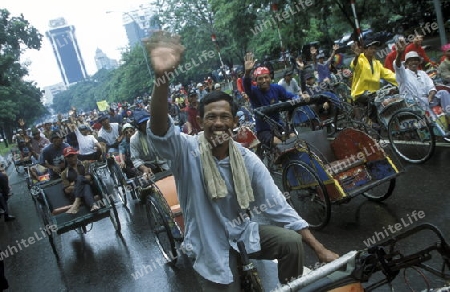 a riksha taxi driver Protest in the city centre of Jakarta in Indonesia in Southeastasia.