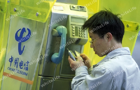 a telephone of china telecom in the City of Shanghai in china in east asia. 