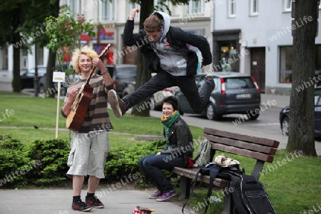 Kids play music and dance in the City Vilnius with the Cityhall  in the Baltic State of Lithuania,  