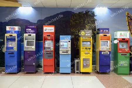 bank ATM at the airport of Phuket in Thailand in Suedostasien.