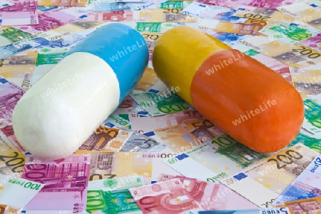 Tabletten auf Euroscheine