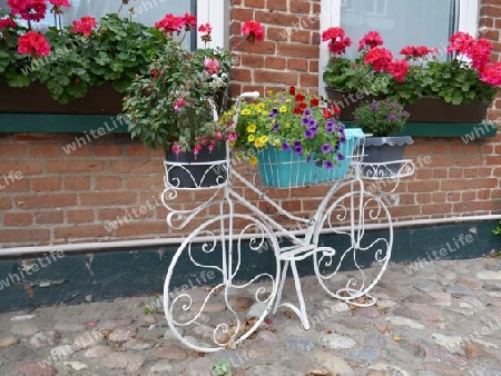 Fahrrad Dekoration vor einem Haus