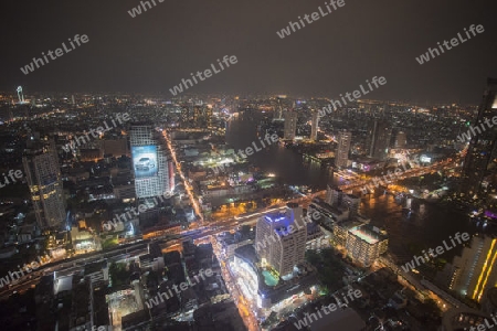 The Skyline view from the Sky Bar at the Riverside Aerea in the city of Bangkok in Thailand in Southeastasia.