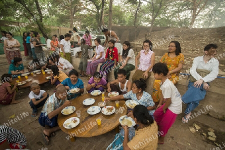 People on a Lunch near the Temple Lawkananda in New Bagan in Myanmar in Southeastasia.