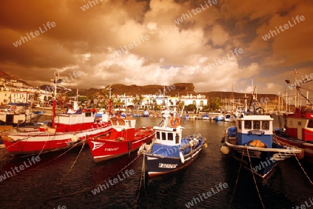 the harbour of the fishing village of  Puerto de Mogan in the south of Gran Canay on the Canary Island of Spain in the Atlantic ocean.