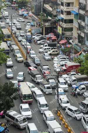 a road in the china town in the City of Yangon in Myanmar in Southeastasia.