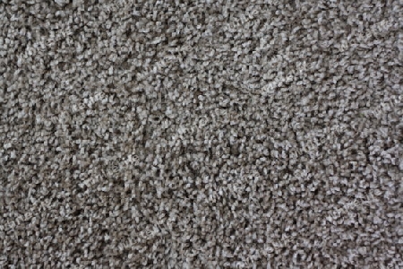 grauer Teppichboden in Nahaufnahme als Hintergrund