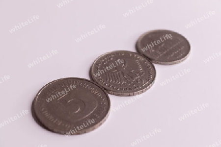 Several coins of the no longer current currency Deutsche Mark from Germany