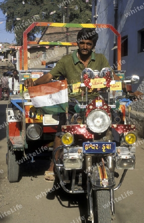 A Motobike Taxi in city of Ahmedabad in the province of Gujarat in India.