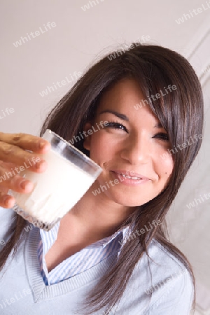 Teenager drinking milk