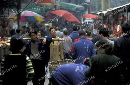 people on the Market streets of Chongqing in the province of Sichuan in china in east asia. 
