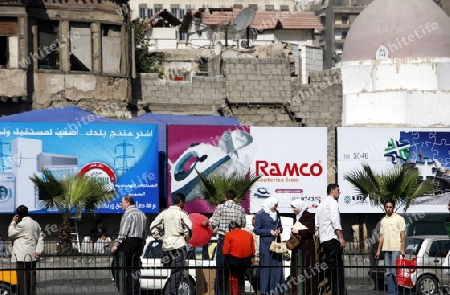Der Alltag mit dem Strassenverkehr im Stadtzentrum der Syrischen Hauptstadt Damasku