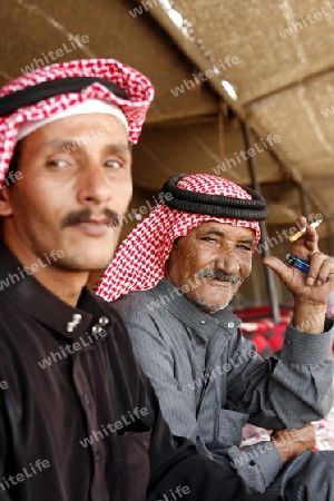 Beduine men in the Wadi Rum Desert in Jordan in the middle east.