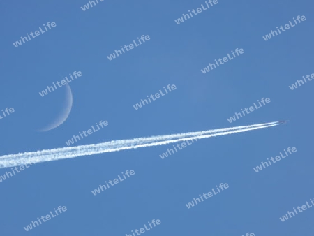 Airplane underlining moon