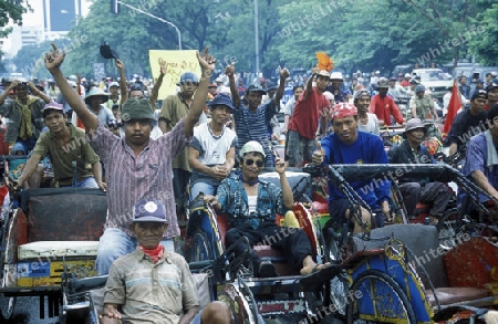 a riksha taxi driver Protest in the city centre of Jakarta in Indonesia in Southeastasia.