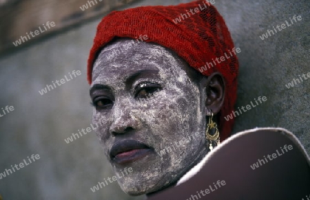 a women in the city of Moutsamudu on the Island of Anjouan on the Comoros Ilands in the Indian Ocean in Africa.   