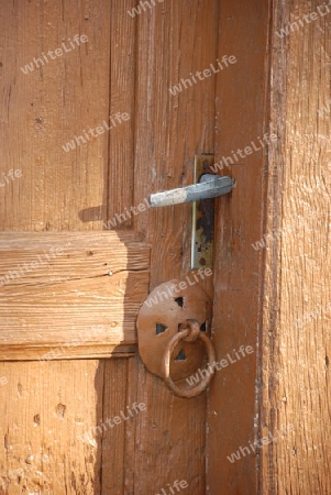 Iron ring in a wooden door