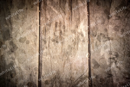 Old and weathered vintage wooden plank background with scratches 