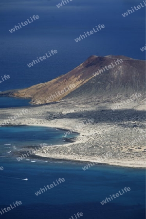 The  Isla Graciosa from the Mirador del Rio viewpoint on the Island of Lanzarote on the Canary Islands of Spain in the Atlantic Ocean. on the Island of Lanzarote on the Canary Islands of Spain in the Atlantic Ocean.
