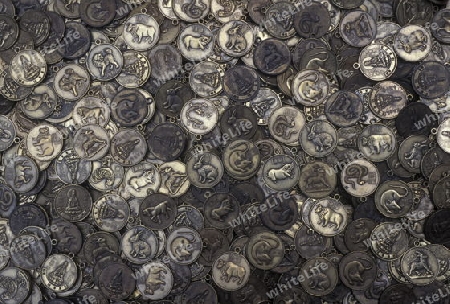 coins in a temple in the city of Chongqing in the province of Sichuan in china in east asia. 