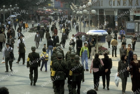 The army and people on the streets of Chongqing in the province of Sichuan in china in east asia. 