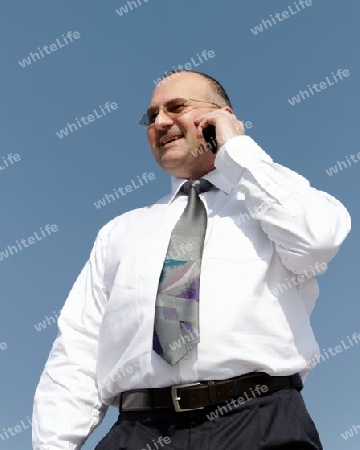 a businessman calling a company