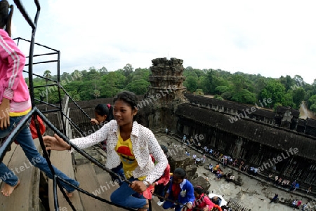 Tourists at the Angkor Wat in the Temple City of Angkor near the City of Siem Riep in the west of Cambodia.