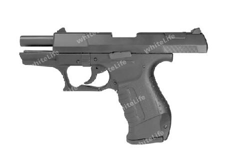 sideways studio photography of a black pistol in white back