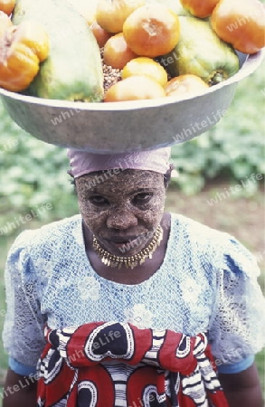 a women in the city of Moutsamudu on the Island of Anjouan on the Comoros Ilands in the Indian Ocean in Africa.   