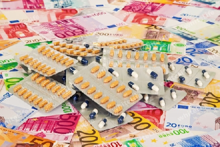Tabletten auf Euroscheine