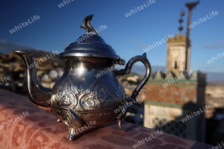 A Minttea in a teahouse in the old City in the historical Town of Fes in Morocco in north Africa.